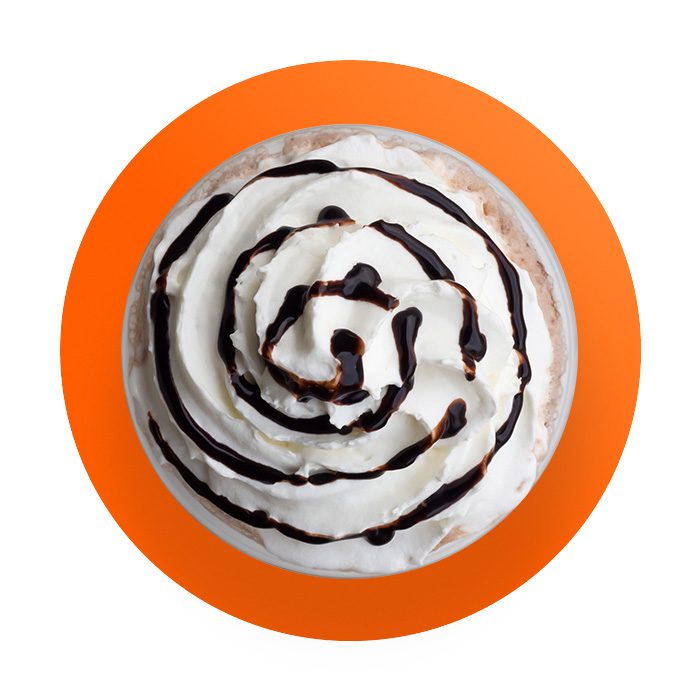 drink with chocolate syrup and whip cream