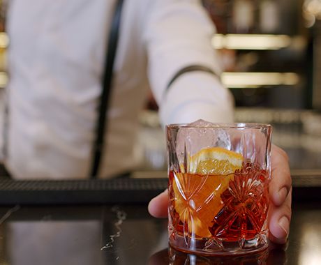 hand serving glass drink
